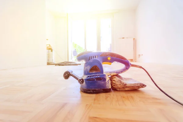 Renovating at home: sander tool for refreshing and grinding the — Stock Image Renovating at home: sander tool for refreshing and grinding the Royalty Free Stock Images