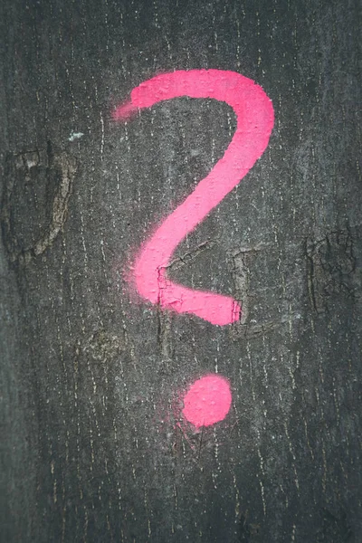 question mark is written on the tree
