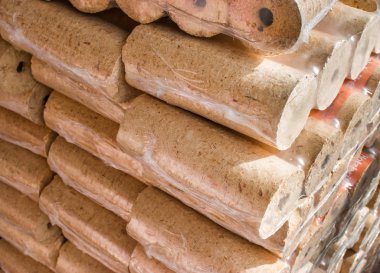 Fuel briquettes folded in rows