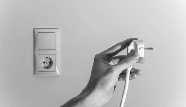 Hand Holding Power Plug — Stock Photo, Image