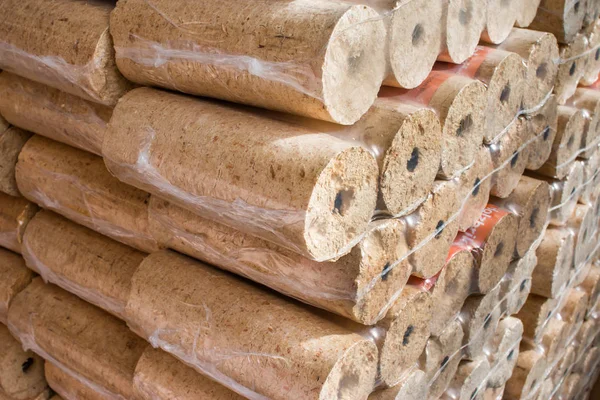 Fuel briquettes folded in rows