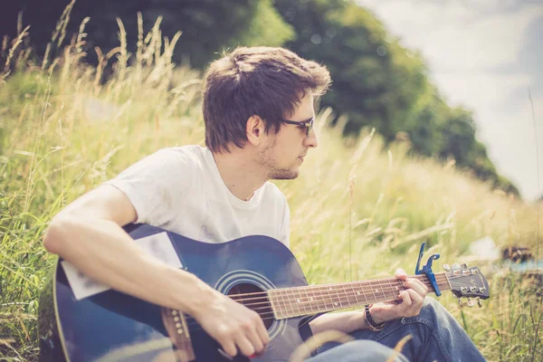 Handsome Man Plays Classical Guitar Outdoor — Stock Photo, Image