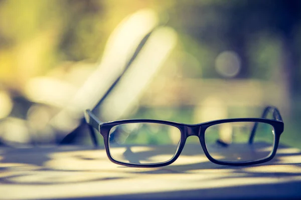 Close Glasses Book Green Grass — Stock Photo, Image