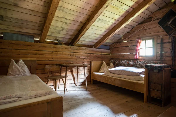 Inside of a rustic wooden alpine hut or cabin, Austria