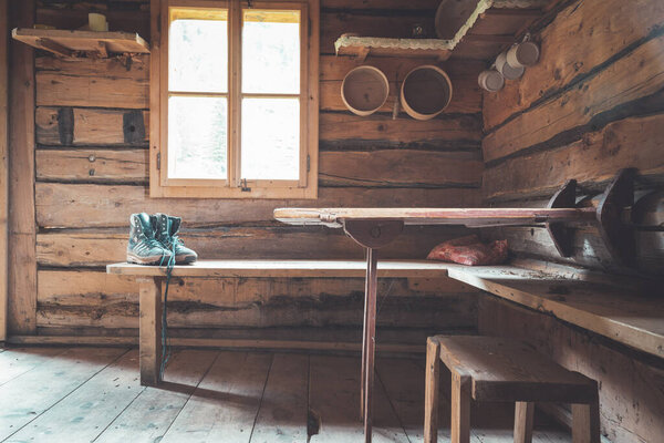 Interior of an old rustic abandoned alpine chalet in Austria