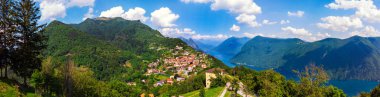 Lugano Gölü üzerindeki BRE kasabasının güzel panoramik manzarası