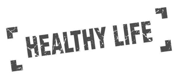 Здоровий довічний штамп. здорове життя квадратний гранжевий знак. здорове життя — стоковий вектор