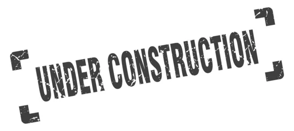 Timbre en construction. sous construction carré signe grunge. en construction — Image vectorielle