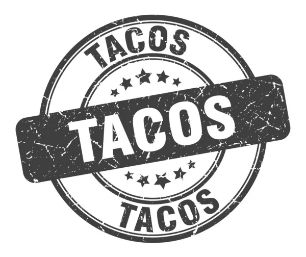 Tacos pieczęć. Tacos okrągły grunge znak. Tacos — Wektor stockowy