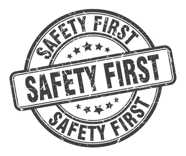 Πρώτη σφραγίδα ασφαλείας. ασφάλεια πρώτο γύρο γκραντζ πινακίδα. ασφάλεια πρώτα — Διανυσματικό Αρχείο