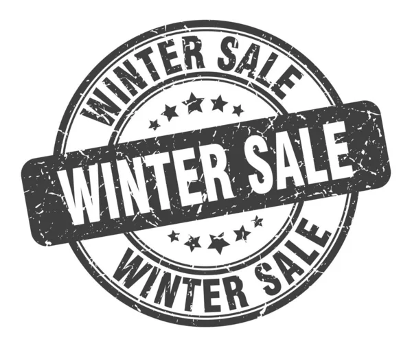 Timbro di vendita invernale. vendita invernale segno grunge rotondo. vendita invernale — Vettoriale Stock