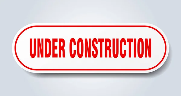 Under construction sign. under construction rounded red sticker. under construction — Stock Vector