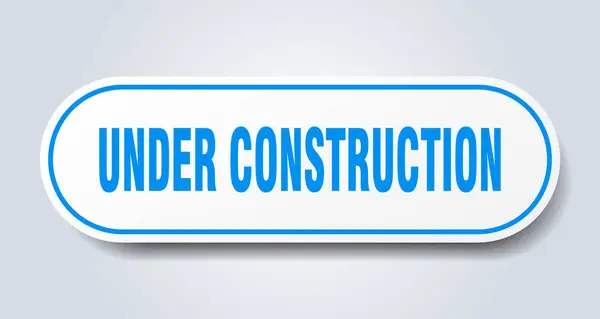 Onder bouw teken. onder constructie afgerond blauwe sticker. in aanbouw — Stockvector