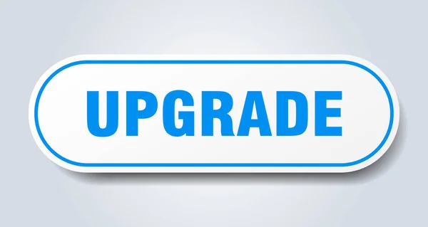 Znak pro upgrade. upgrade zaobleného modrého štítku. Upgrade — Stockový vektor