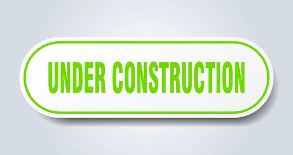 Under construction sign. under construction rounded green sticker. under construction — Stock Vector