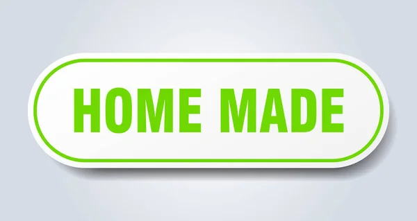 Señal hecha en casa. etiqueta engomada verde redondeada hecha en casa. hecho en casa — Archivo Imágenes Vectoriales