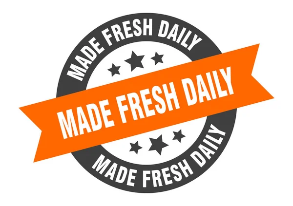 Made fresh daily sign. made fresh daily orange-black round ribbon sticker — Stock Vector