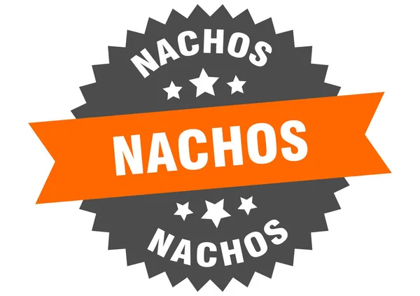 Nachos的标志。 玉米片橙色-黑色圆形带标签 — 图库矢量图片