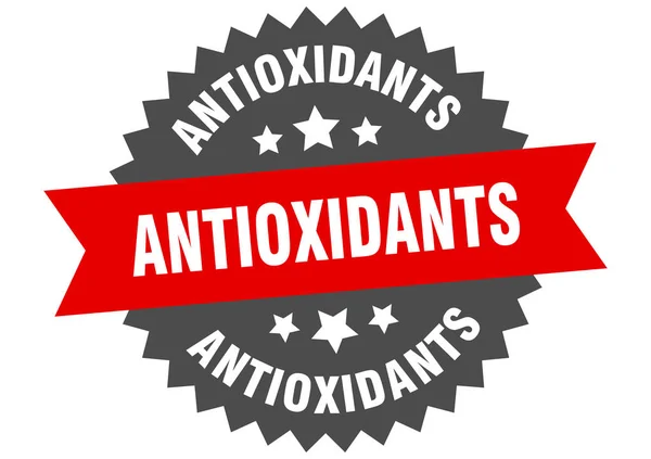 Antioxidants sign. antioxidants red-black circular band label — Stock Vector