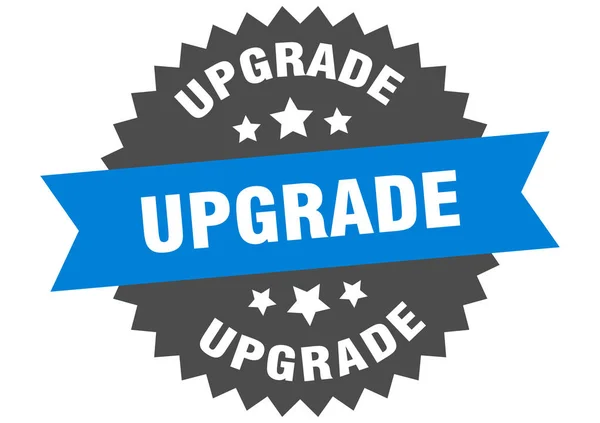 Upgrade sign. upgrade blue-black circular band label — Stock Vector