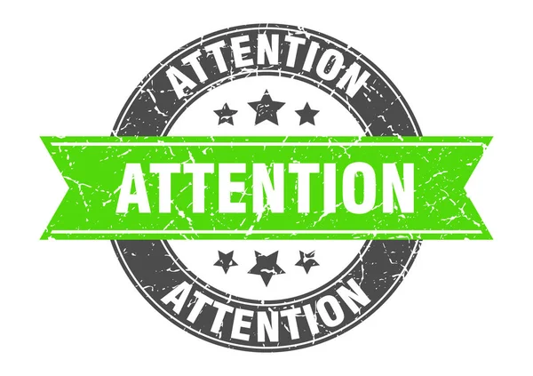 Attention timbre rond avec ruban vert. attention — Image vectorielle