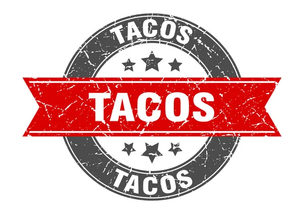 Tacos round stamp with red ribbon. tacos — Stock vektor