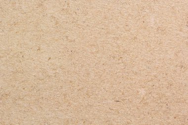 Geri dönüştürülmüş kağıt dokusu. Kahverengi zanaat kağıt closeup arka plan