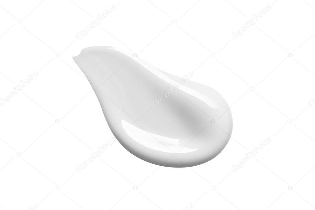 White cosmetic cream swipe isolated on white background. Makeup foundation smudge. BB, CC, DD cream texture