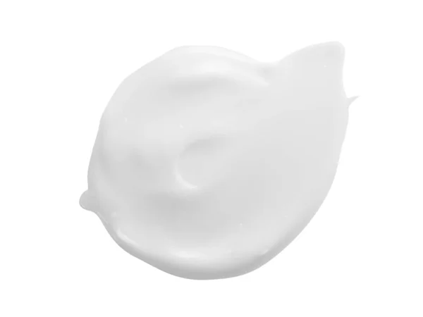 Beyaz krem smear beyaz arka plan üzerinde izole. Kozmetik losyon kaydırma örneği. Kremsi makyaj dokusu