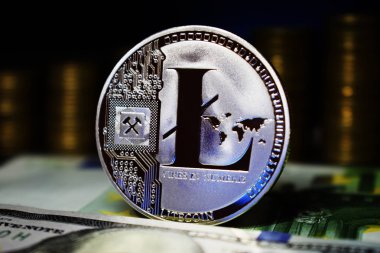 Madeni para fiziksel Litecoin Ltc, banknot ve altın sikke arka plan.