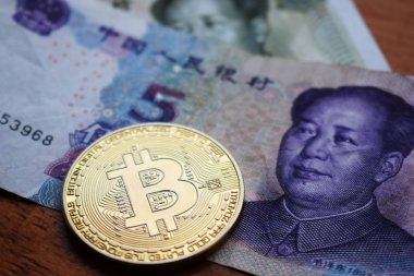 Bitcoin altın sikke Çin Yuan banknotlar üzerinde