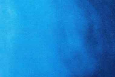 Boyalı kumaşın arka planı. Güzel soyut bir arka plan. Gökyüzü, deniz, mavi arkaplan