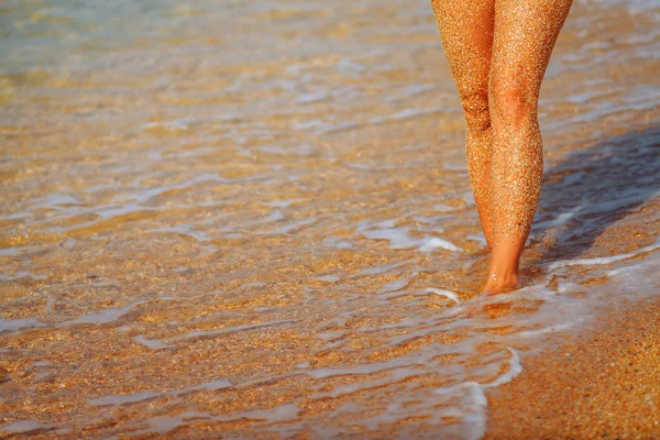 Feet girl on the beach