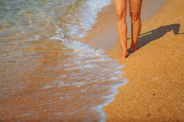Feet girl on the beach