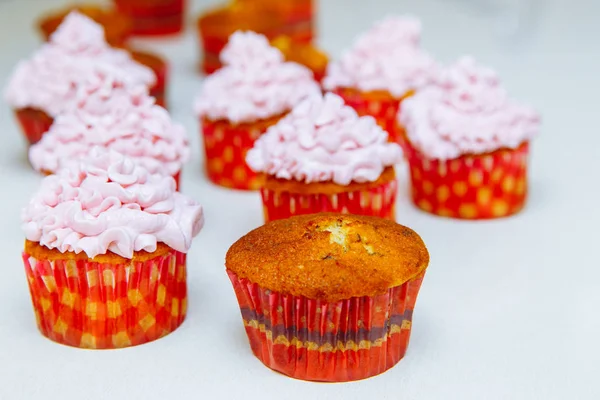 Cooking cupcakes at home. Pink Cream Baking Decoration