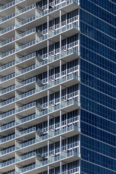 Part of skyscraper with glass balcony in Downtown Miami, Florida