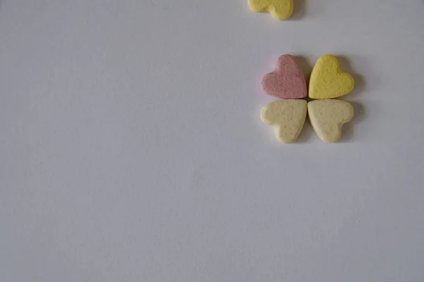 Several Pink Yellow Vitamins Shape Heart Lie White Background Form — Stock Photo, Image