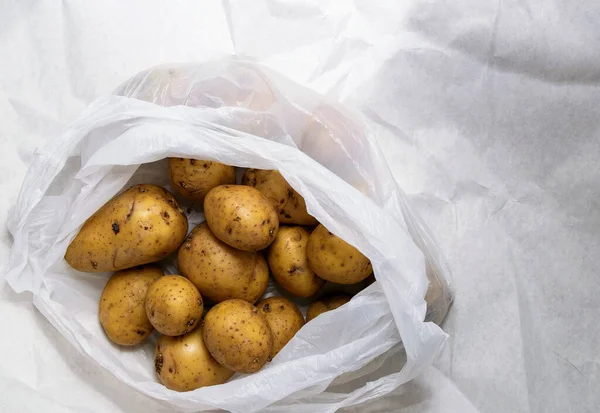 Pile Unwashed Potatoes Lies White Bag — Stock Photo, Image