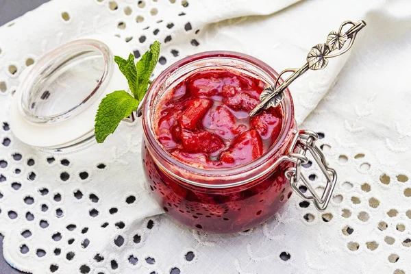 Strawberry jam in a glass jar. — Stock Photo, Image