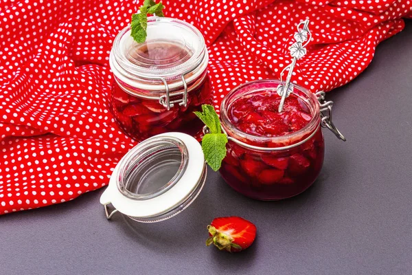 Strawberry jam in a glass jar. — Stock Photo, Image