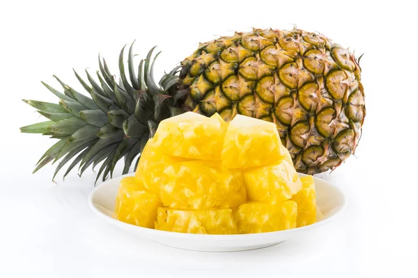 Slice of pineapple on white dish