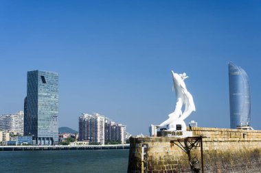 Xiamen skyline with blue sky, beautiful coastal city, China clipart