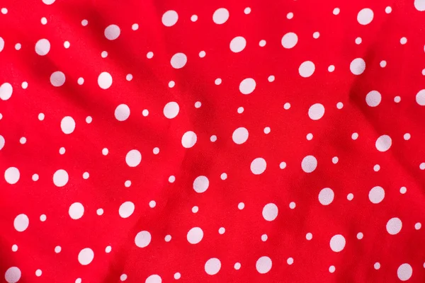 Polka dot sobre tela vermelha textura de algodão, fundo de tecido — Fotografia de Stock