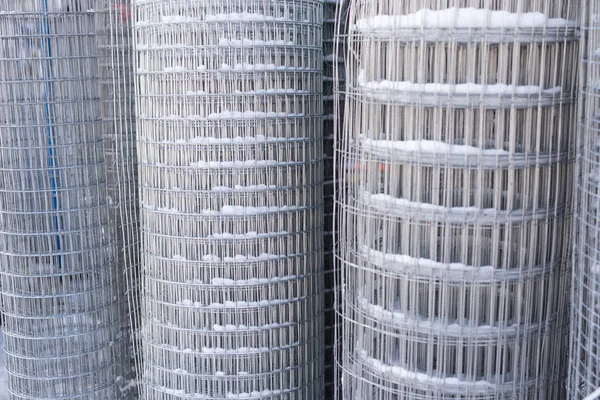 Galvanized welded wire mesh twisted into a roll