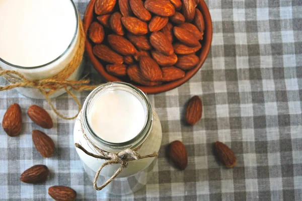 Almond milk and almonds. Dietary milk. Milk for diabetics. Lactose-free milk. Vegan drink.