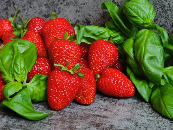 Strawberries and basil. Right combination of products. Products for weight reduction. Macro.