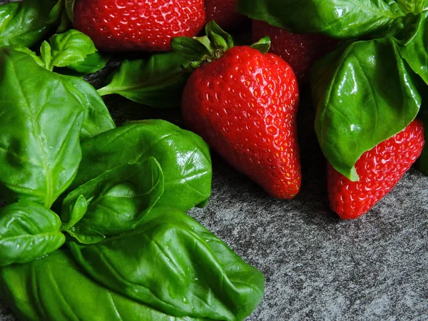 Strawberries and basil. Right combination of products. Products for weight reduction. Macro.