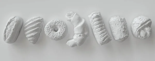 Piezas de repostería pintadas blancas sobre fondo blanco - Representación 3D — Foto de Stock