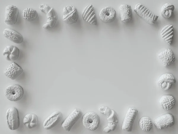 Piezas de repostería pintadas blancas sobre fondo blanco - Representación 3D — Foto de Stock