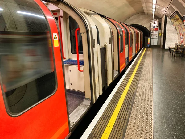 Underground wagon stopped in station ready to go, London.